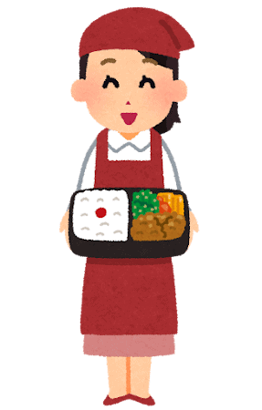 エプロンをつけた女性が笑顔でお弁当を手渡しているイメージ